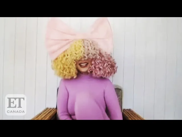 sia reveals she adopted two teenage boys